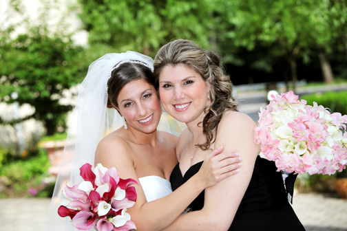the bridesmaid has traditional makeup and the bride has airbrush makeup application