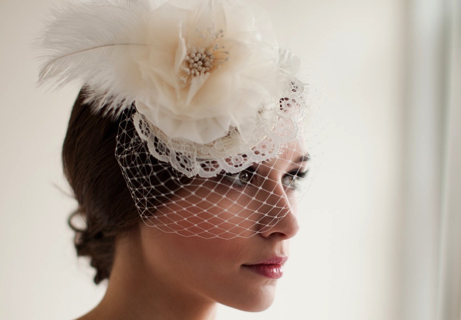 feather and lace embellished mini bridal hat